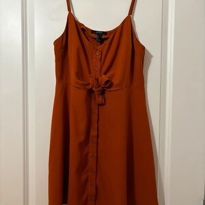 Red suspender dress with bow